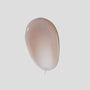 Texture shot of 003-Hy Hydrating Face Cream on white surface