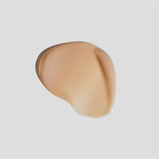 Texture shot of 004-Br Skin Brightening Cream on white surface