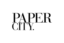 Black and white logo of Paper city on white background