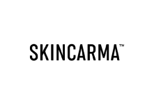 Black and white logo of Skincarma on white background